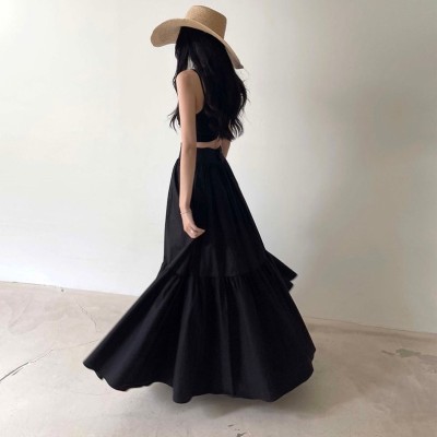 黑色褶皱短版吊带上衣+大裙摆半身裙套装