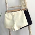 Creamy white high-waist woolen A-line shorts