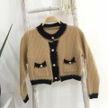 Chanel style knitted long-sleeved top