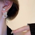 Chanel style double-sided pearl earrings