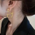 Gold unique letter earrings