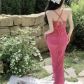 Slit waist and hip-hugging hollow long skirt