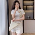 Buttoned tassel long top + shorts modified cheongsam suit