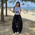High-waisted pleated wide-leg trousers