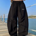 High-waisted pleated wide-leg trousers