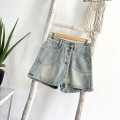 设计感排扣牛仔短裤裙
