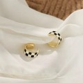 Black and white checkerboard ear clips