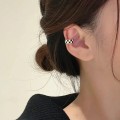 Black and white checkerboard ear clips