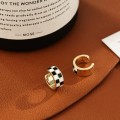 Black and white checkerboard ear clips