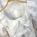 纯白镂空荷叶度假长裙