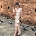 复古印花短版背心+高腰开衩半身裙套装