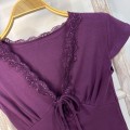 Pure and alluring purple lace-trimmed cropped top with straps