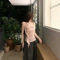 温柔粉一字肩荷叶飘带上衣